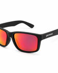 Peppers Beachcomber sunglasses in Matte Black with Brown Fire Red Mirror lens, three-quarter view on white