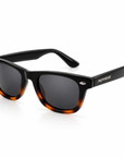 Peppers Chilmark sunglasses in Shiny Black to Tort Frame with Smoke Lens, three-quarter view on white