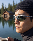 Man, 33, wearing Peppers Ricochet sunglasses in Matte White / Silver Frame with G15 Lens, on a mountain-lake dock