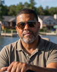 Man, 49, wearing Peppers Django sunglasses in Shiny Dark Antique Brown Frame with Brown Lens, on a lake