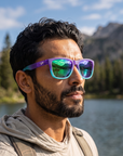 Man, 35, wearing Peppers Sailfish sunglasses in Matte Transparent Purple Gradient Blue Green Diamond Mirror, at an alpine lake trailhead
