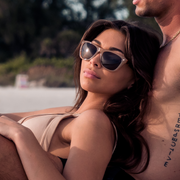 Lifestyle photo of Spitfire sunglasses milky caramel tortoise temple with brown polarized silver flash mirror lens